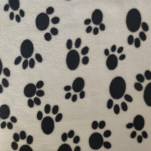 Printed Polar Fleece Fabric Material - WHITE WITH BLACK PAWS